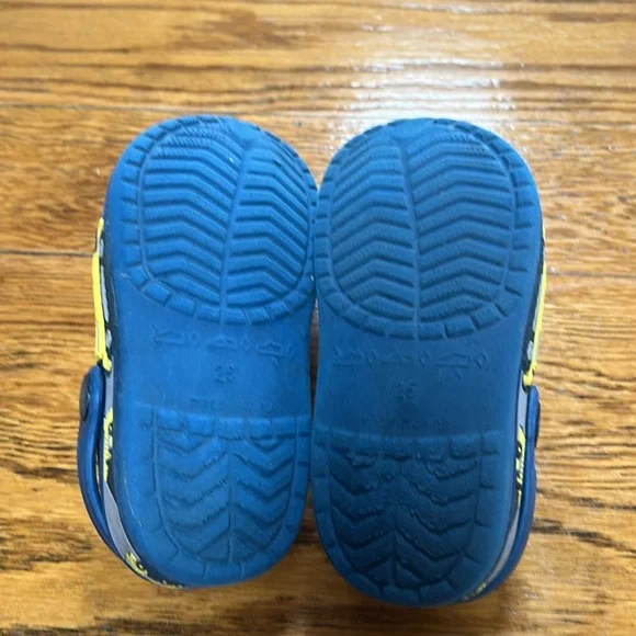 Folhaoth blue rubber open back clogs with yellow excavator on sides.  Toddler 8. - Picture 6 of 10